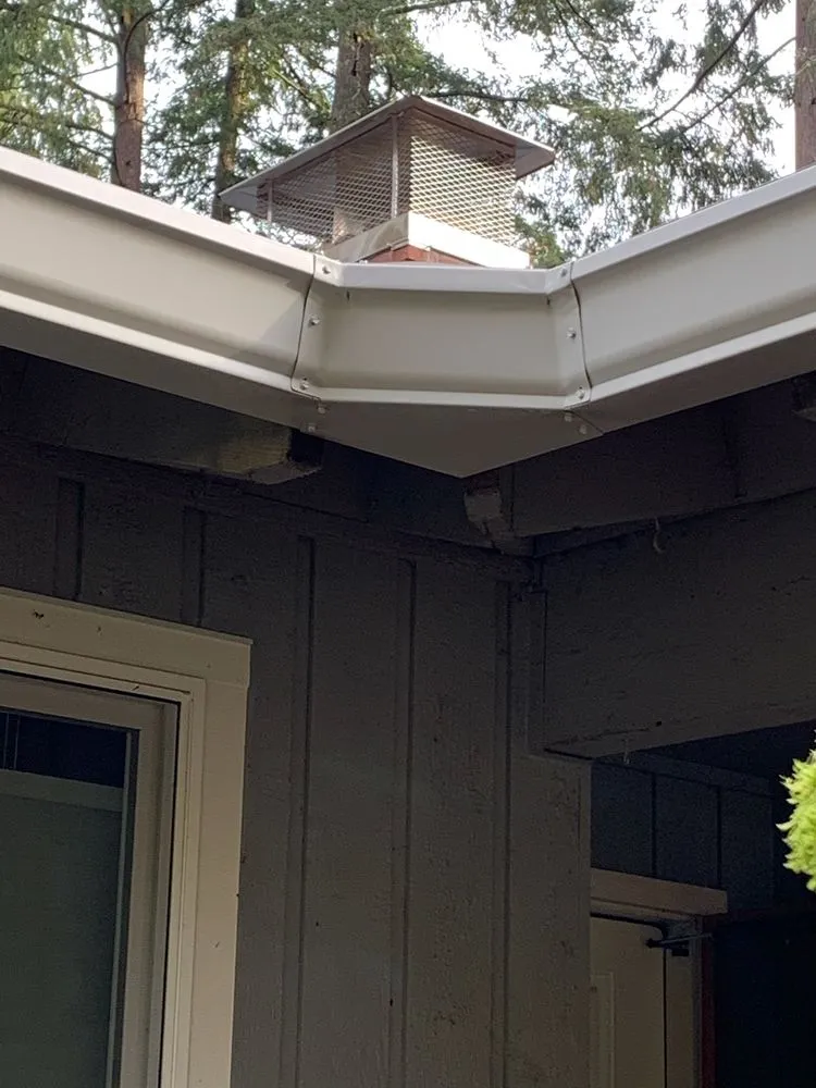 Slide of HER Roofing