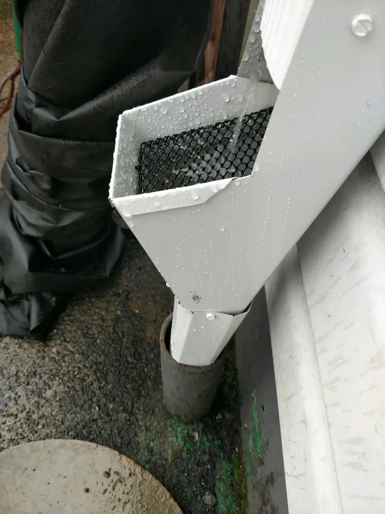 Slide of HER Roofing