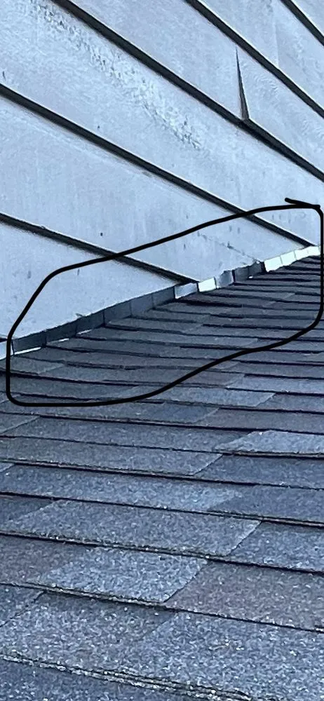 Slide of HER Roofing