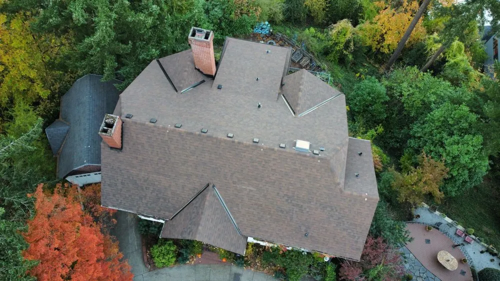 Slide of HER Roofing