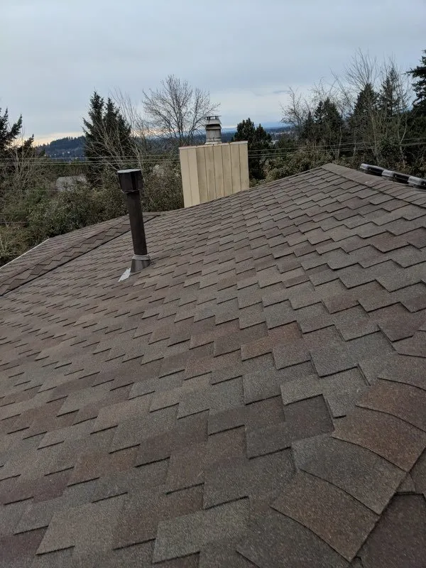 Slide of HER Roofing