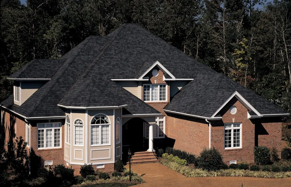 Slide of HER Roofing