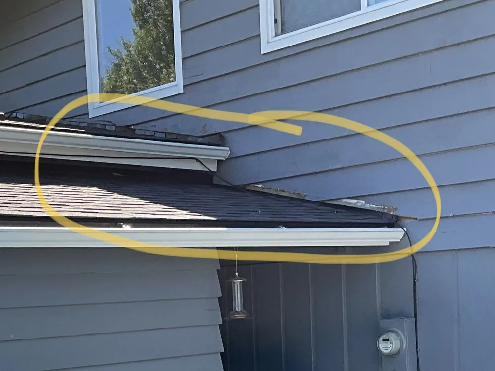 Slide of HER Roofing