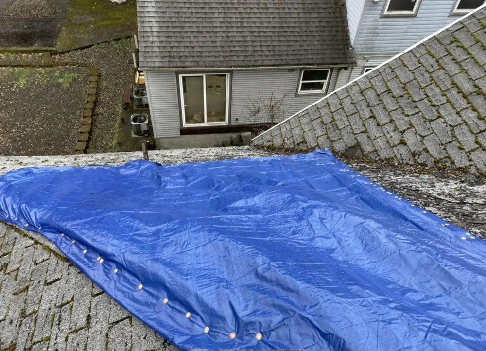 Slide of HER Roofing