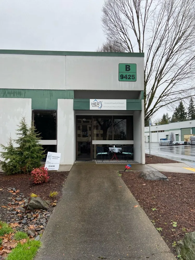 Slide of HER Roofing