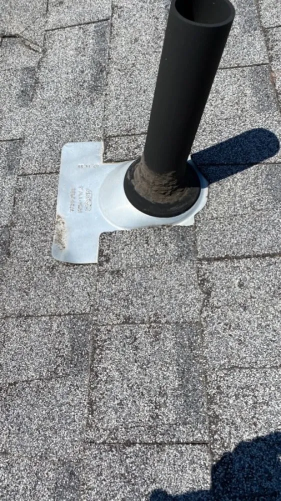 Slide of HER Roofing