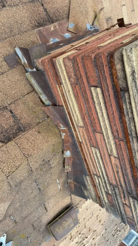 Slide of HER Roofing