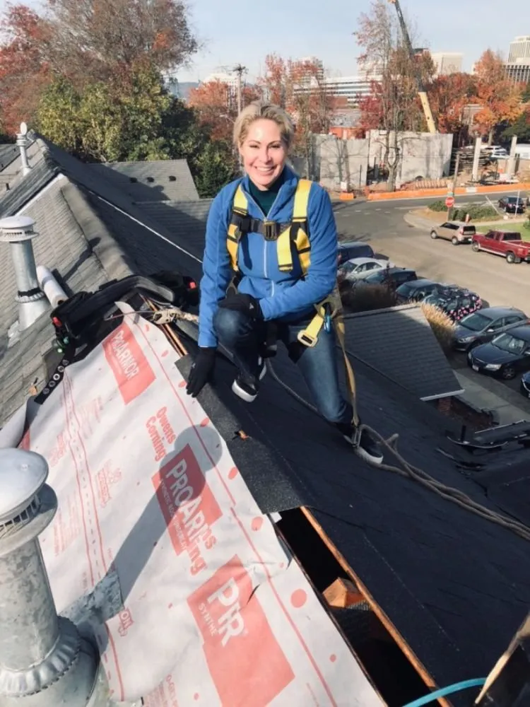 Slide of HER Roofing