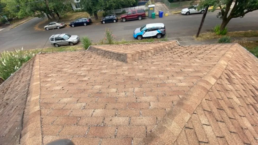 Slide of HER Roofing