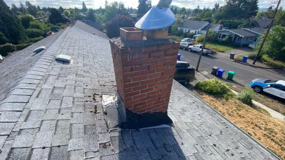 Slide of HER Roofing