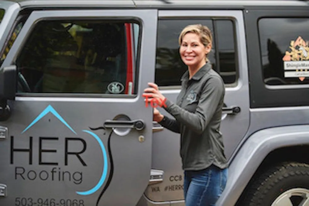 Slide of HER Roofing