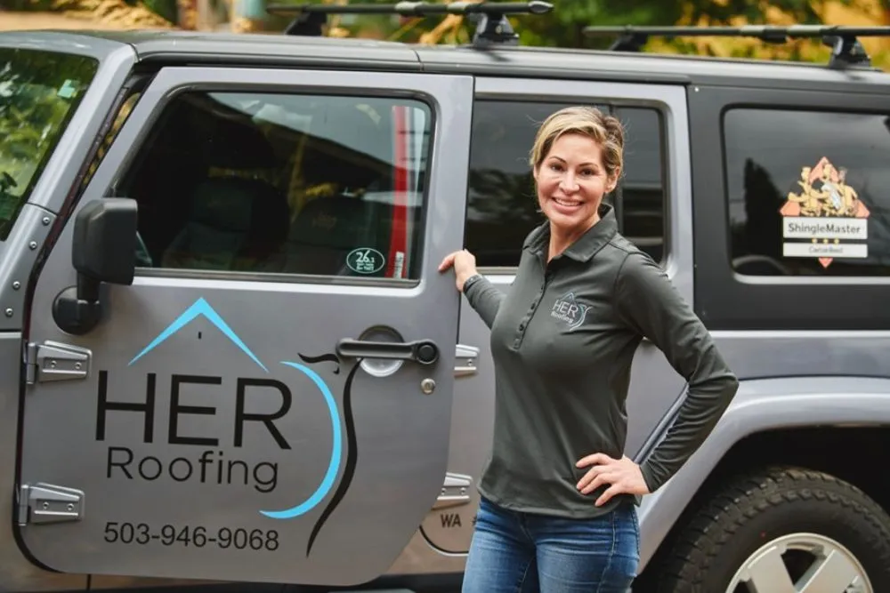 Slide of HER Roofing