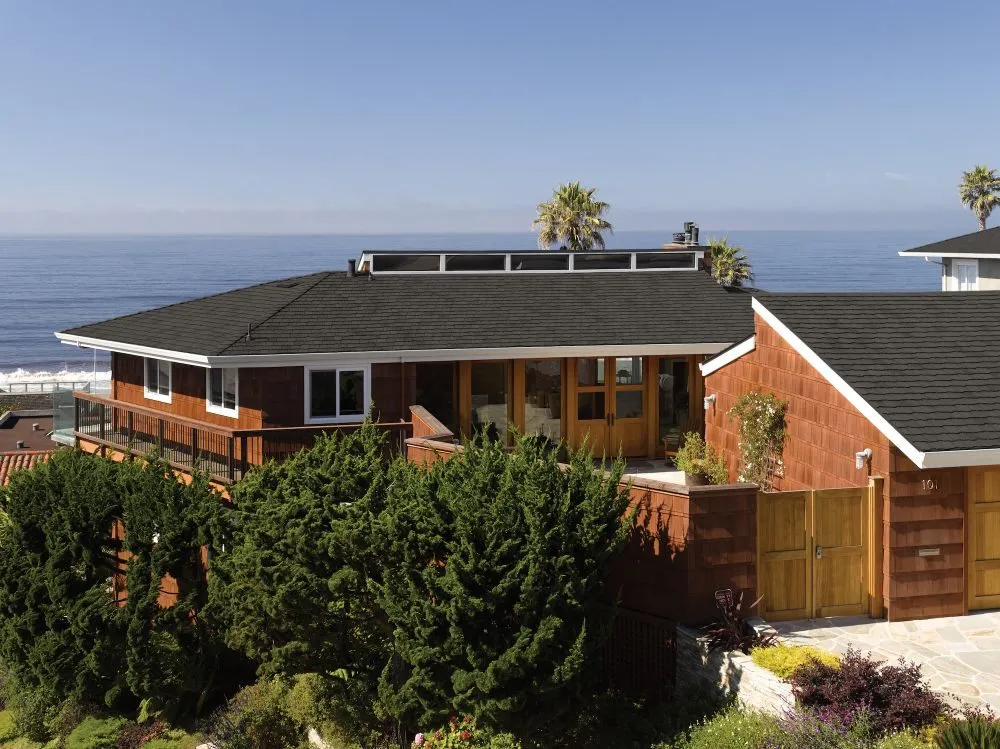 Slide of HER Roofing