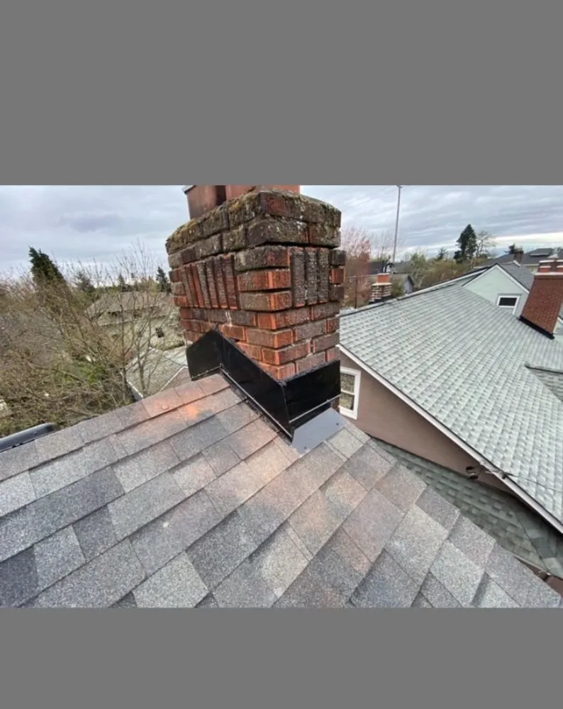 Slide of HER Roofing