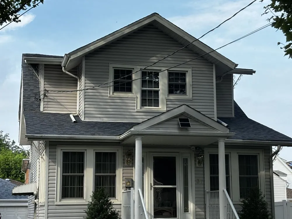 Slide of Heritage Roofing & Chimney