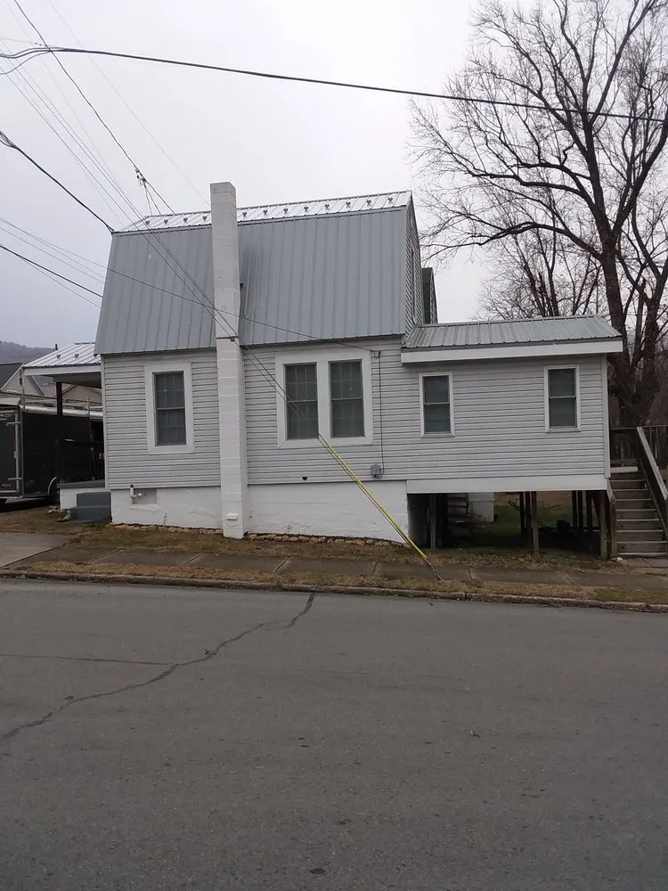 Slide of Heritage Roofing