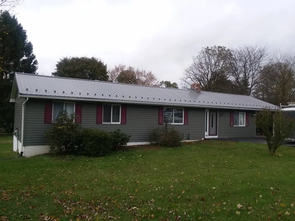 Slide of Heritage Roofing