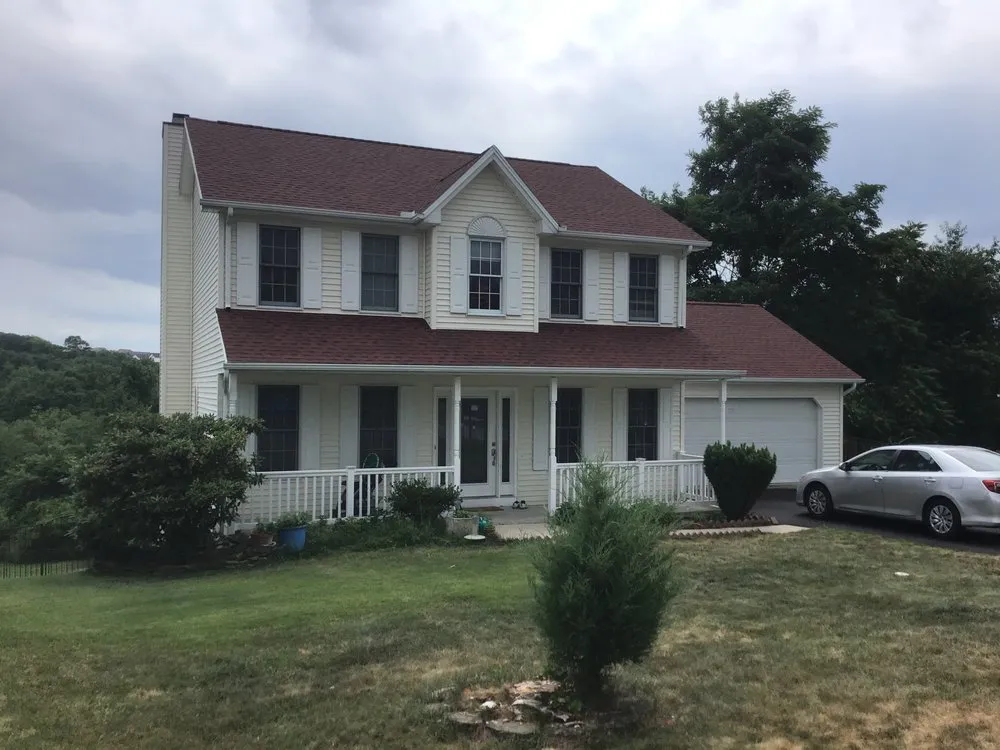 Slide of Heritage Roofing