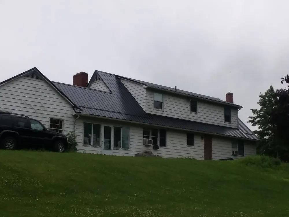 Slide of Heritage Roofing