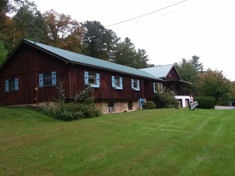Slide of Heritage Roofing