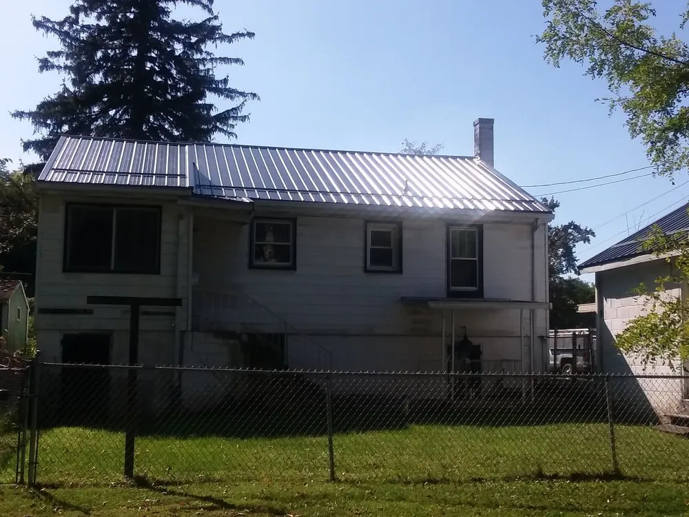 Slide of Heritage Roofing