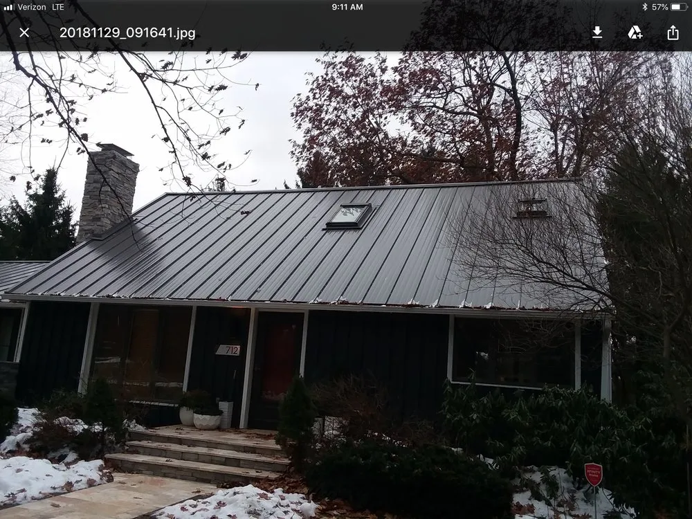 Slide of Heritage Roofing