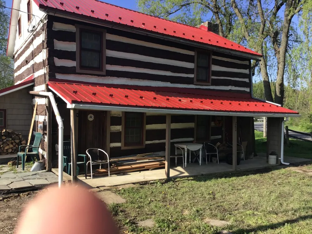 Slide of Heritage Roofing