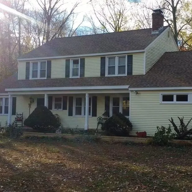 Slide of Heritage Roofing