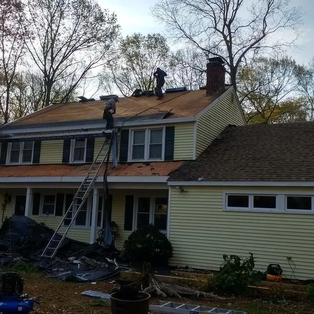 Slide of Heritage Roofing