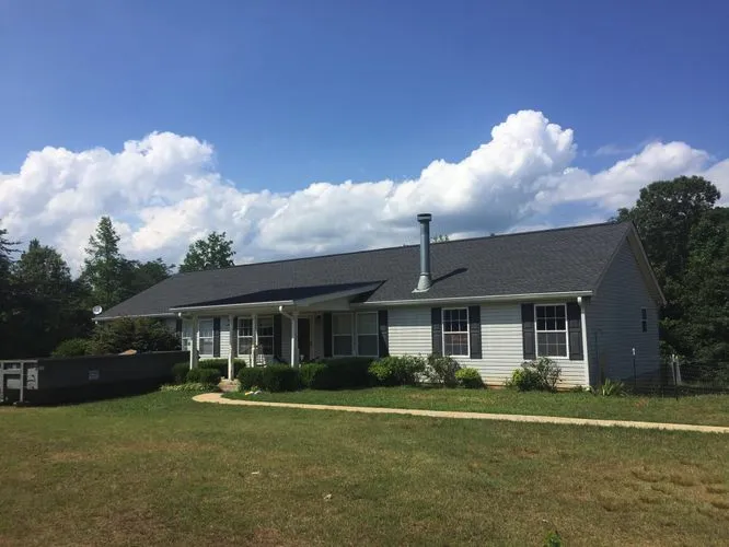 Slide of Heritage Roofing