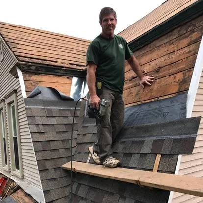 Slide of Heritage Roofing