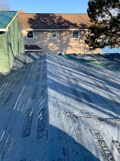 Slide of Heritage Roofing