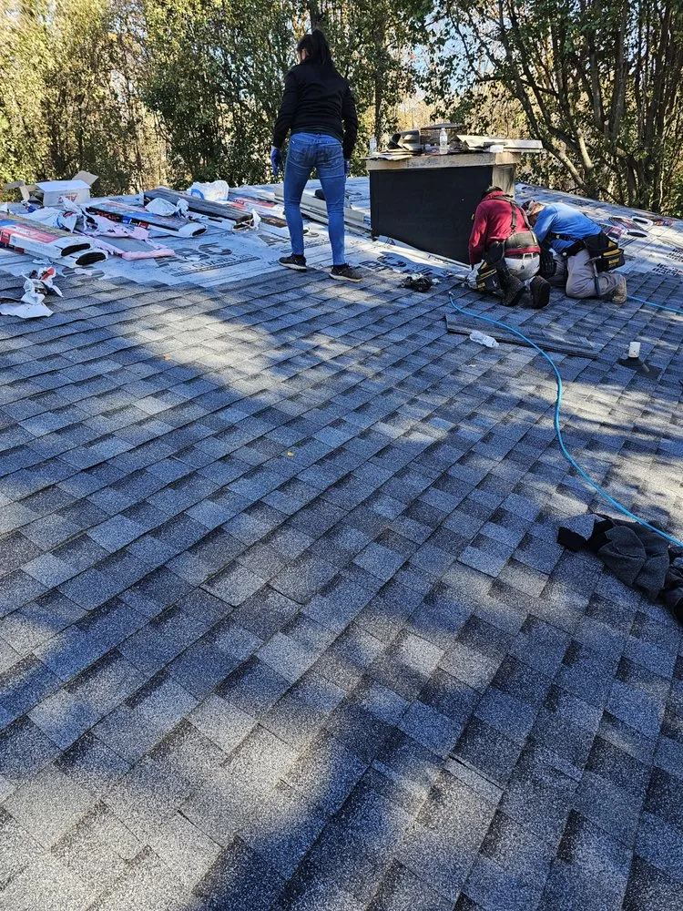 Slide of Heritage Roofing Pros