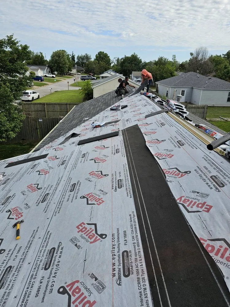 Slide of Heritage Roofing Pros