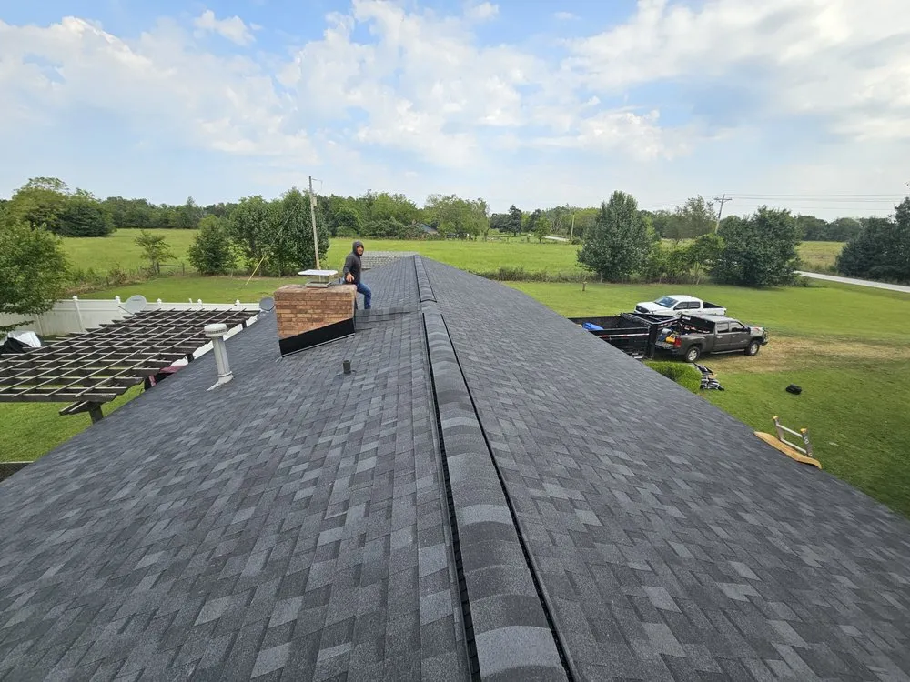 Slide of Heritage Roofing Pros