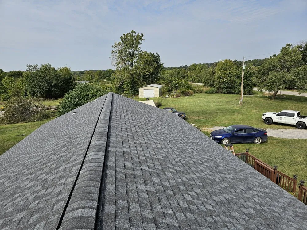 Slide of Heritage Roofing Pros