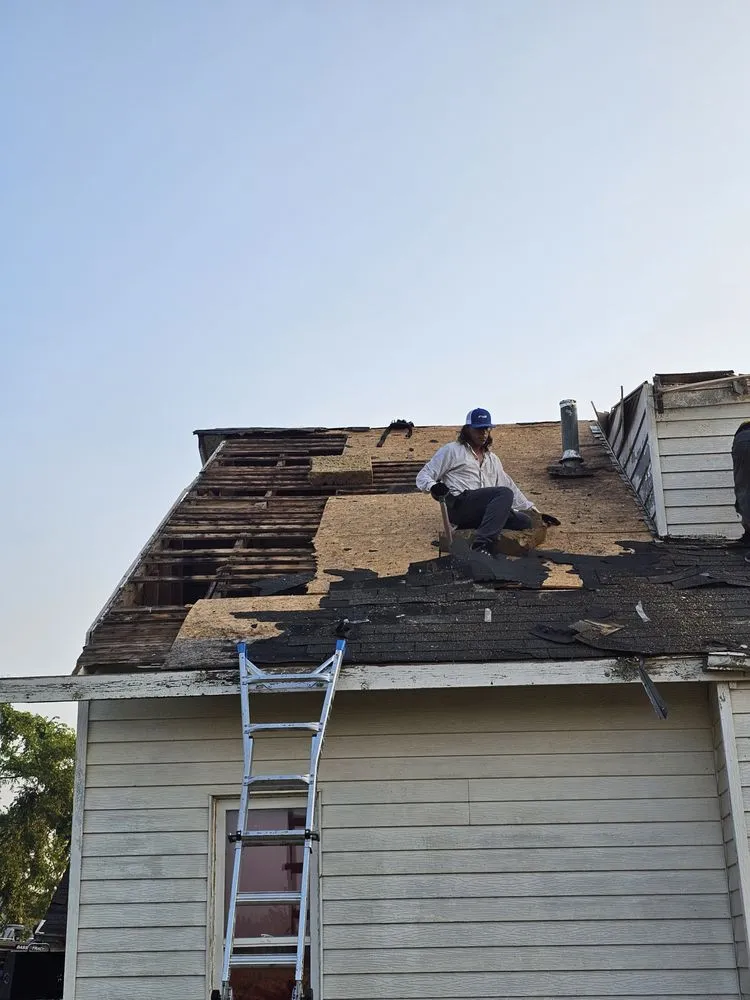 Slide of Heritage Roofing Pros