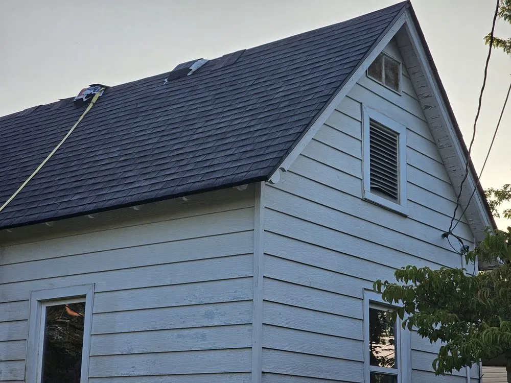 Slide of Heritage Roofing Pros