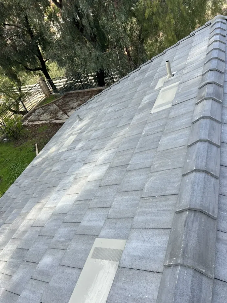 Slide of Heritage Roofing Solutions