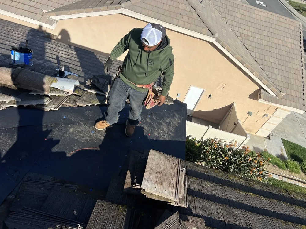 Slide of Heritage Roofing Solutions