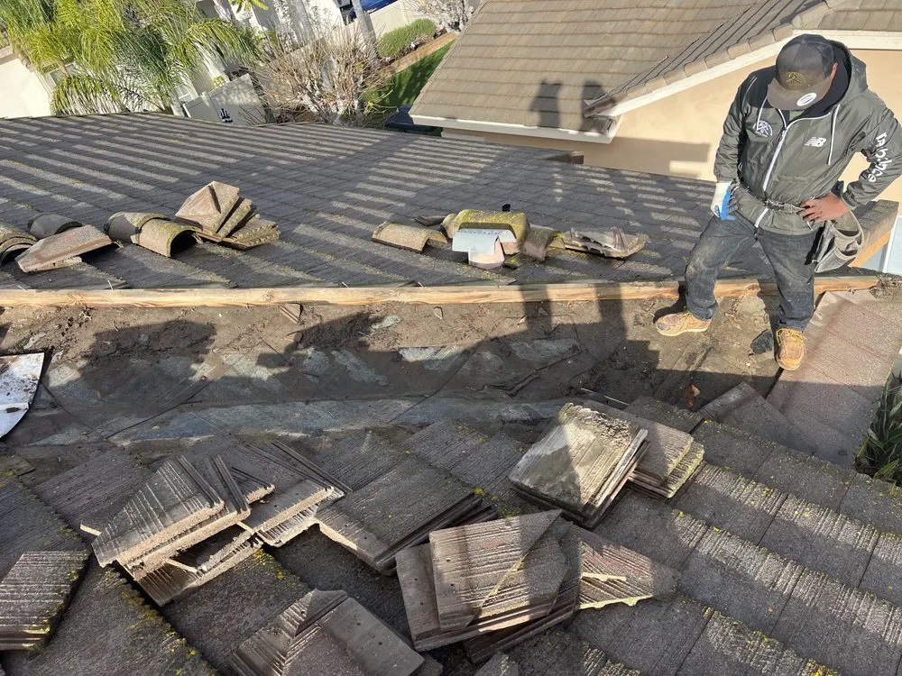 Slide of Heritage Roofing Solutions