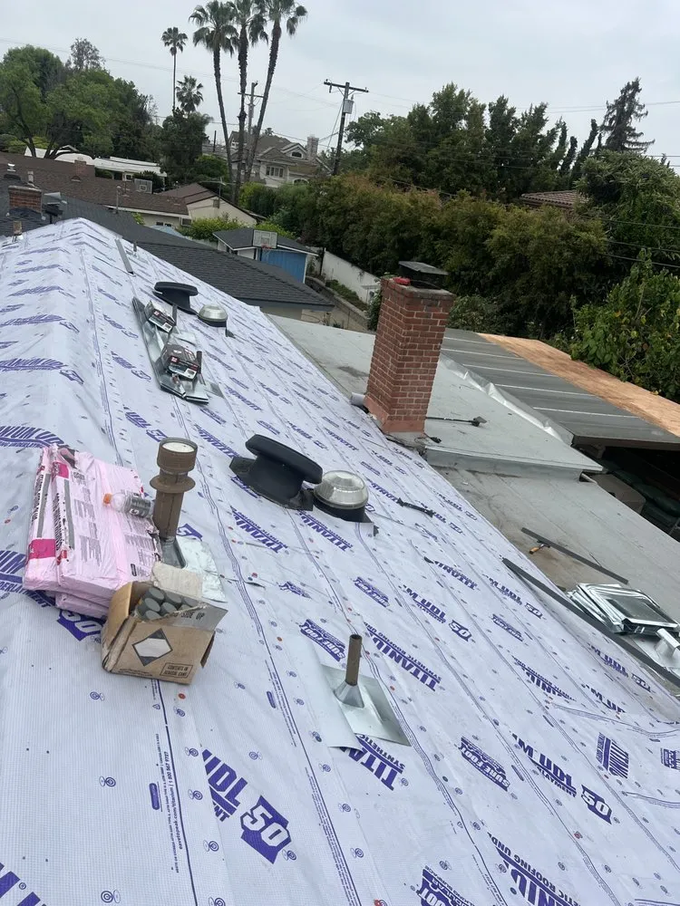 Slide of Heritage Roofing Solutions