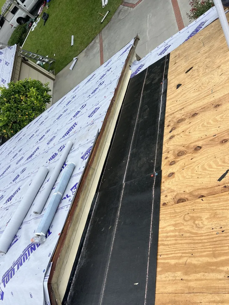 Slide of Heritage Roofing Solutions