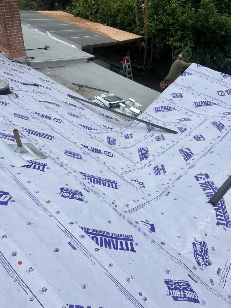 Slide of Heritage Roofing Solutions