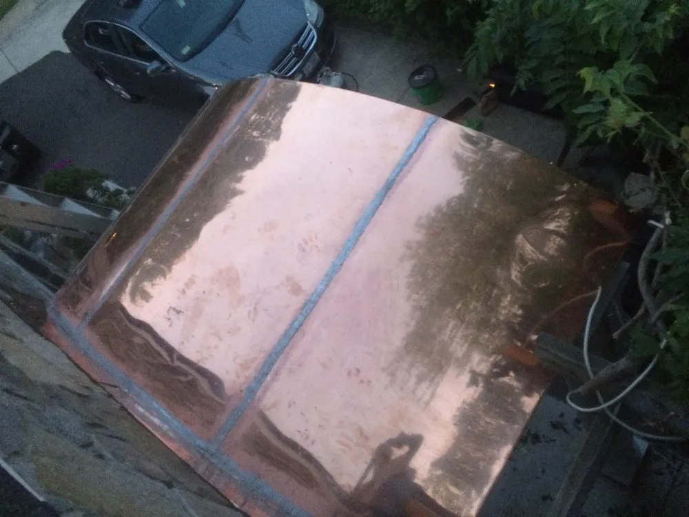 Emergency storm damage roof repair in Arlington, DC by Hermetica