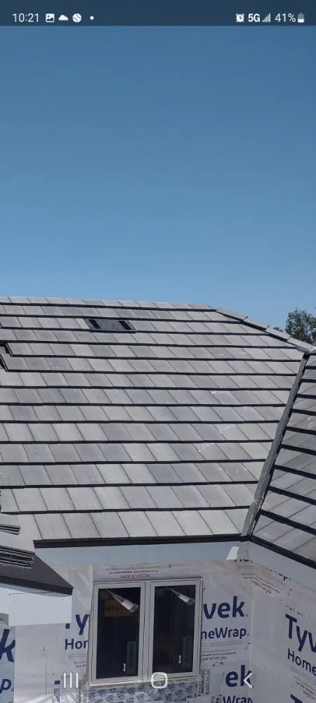 Slide of Hernandez Roofing