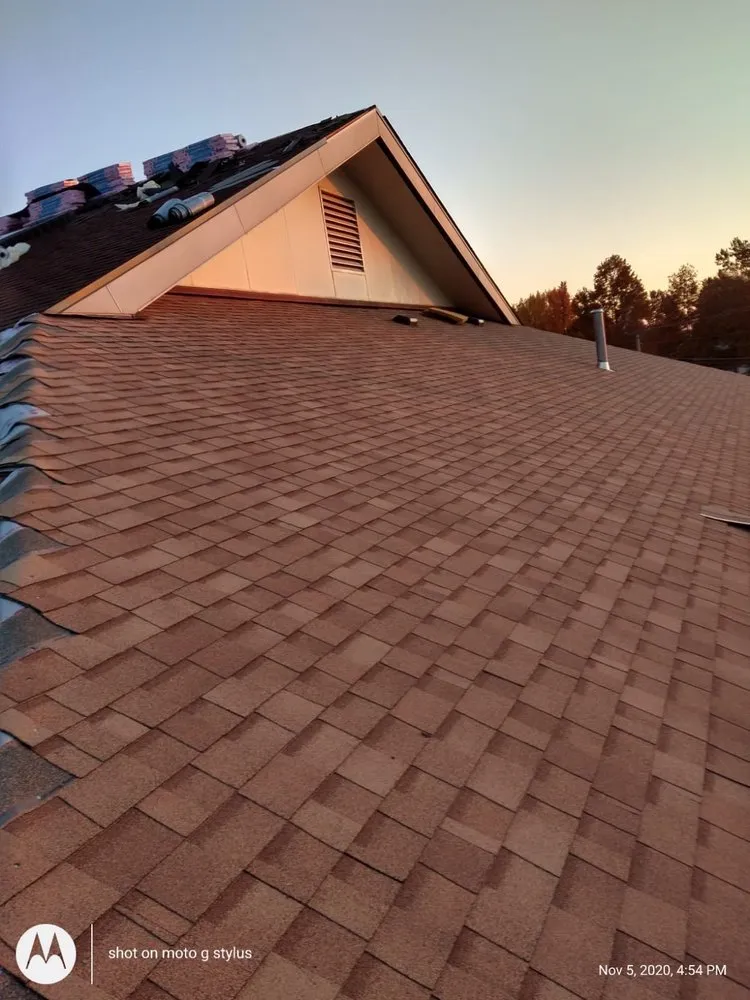 Slide of Hernandez Roofing