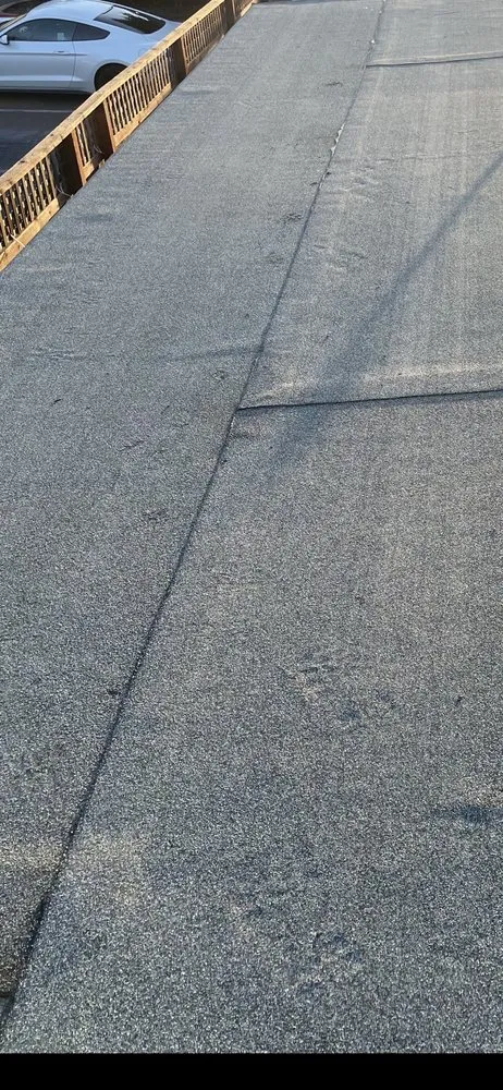 Slide of Hernandez's Roofing