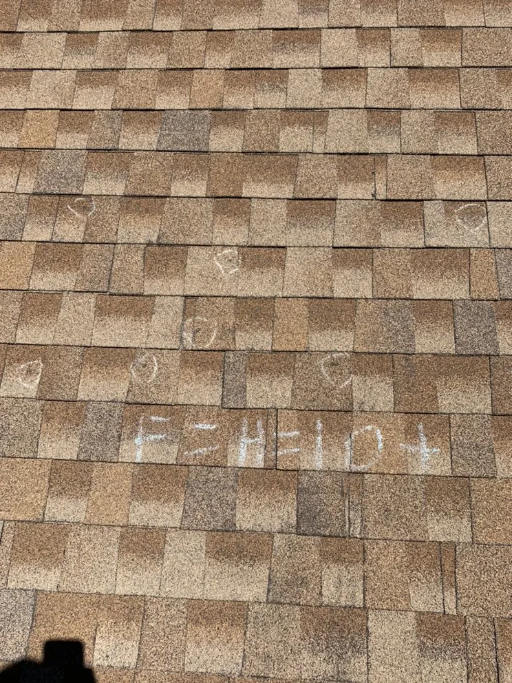 Slide of Heroic Roofing