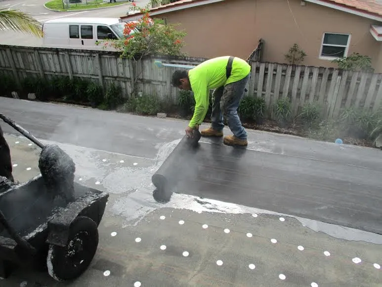 Slide of Heron Bay Roofing